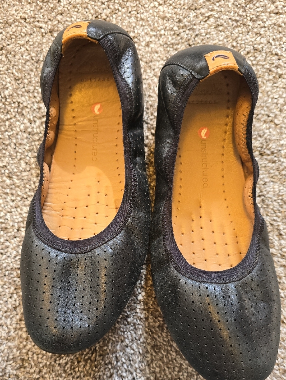 Clarks Black Perforated Leather Ballet Flats with Tan Insole Accents